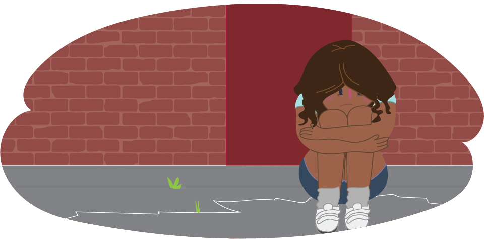 Girl with her head in her knees against a brick wall Girl with her head in her knees against a brick wall